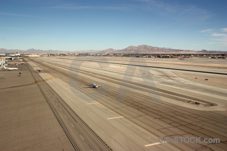 Airport blue airplane runway.
