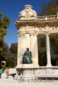 Alfonso statue tree madrid europe.