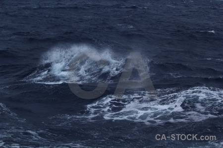 Antarctica cruise spray water wake wave.
