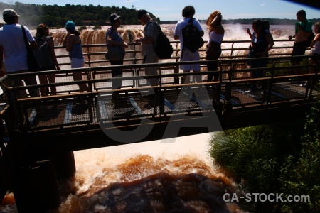 Argentina person river spray railing.