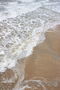 Beach sea water white wave.