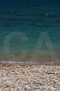 Beach stone javea europe sea.