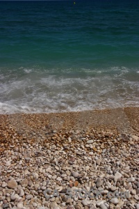 Beach stone water wave javea.