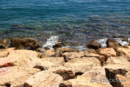 Blue coast rock sea water.