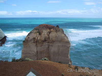 Blue rock cyan coast cliff.