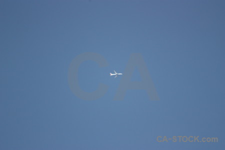 Blue sky airplane flying.