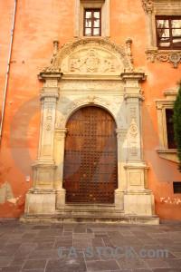 Brown door entrance historic building.