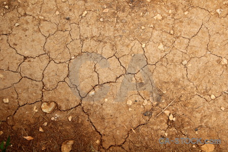 Brown soil texture orange crack.