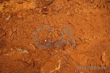 Brown texture orange soil crack.