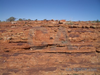 Cliff rock blue brown.