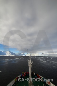 Cloud boat person antarctica deck.