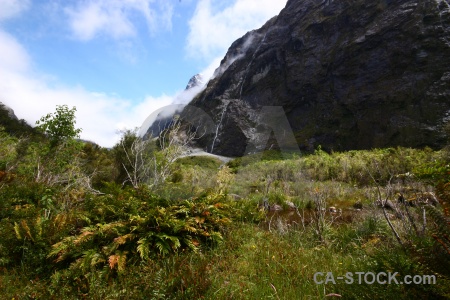 Cloud mountain new zealand grass south island.