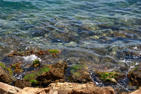 Coast rock sea water blue.