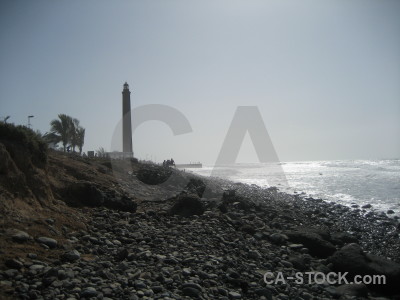 Coast sea beach landscape lighthouse.