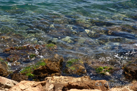 Coast sea blue rock water.