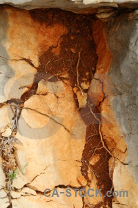 Crack orange brown stone texture.