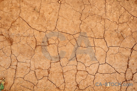 Crack orange soil texture.