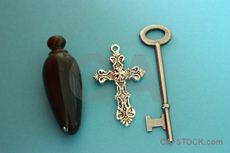 Cross vial key cyan object.
