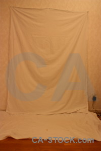 Curtain cloth orange object brown.