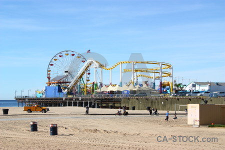Ferris wheel fairground beach.