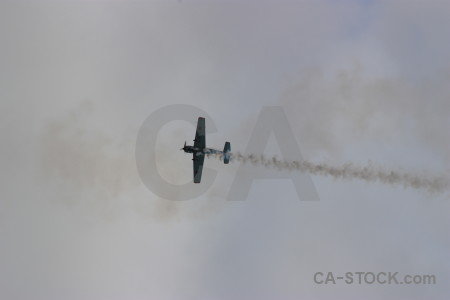 Gray airplane smoke.