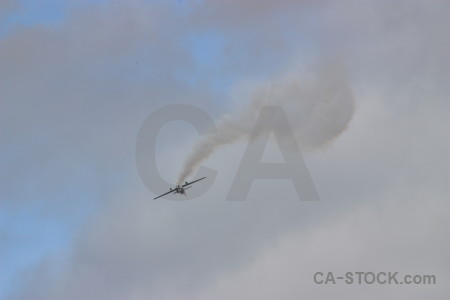 Gray airplane smoke.