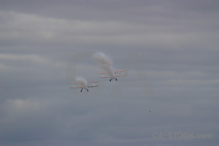 Gray airplane smoke.