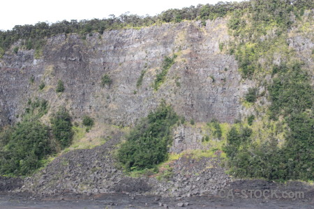 Gray cliff crater volcanic green.