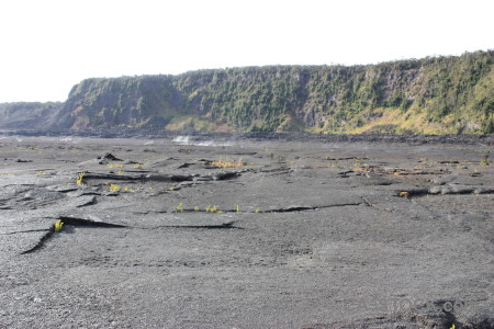 Gray lava volcanic crater white.