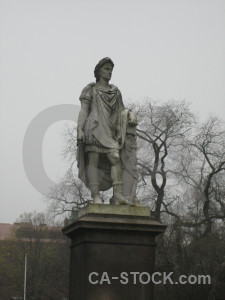 Gray statue figure.