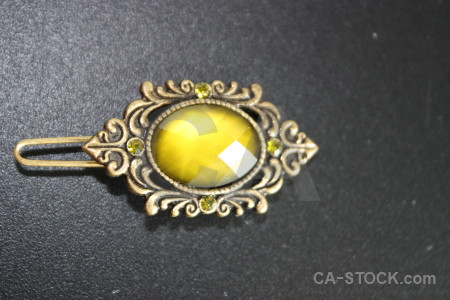 Gray yellow object jewellry.