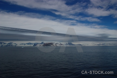 Iceberg water antarctic peninsula snowcap sea.