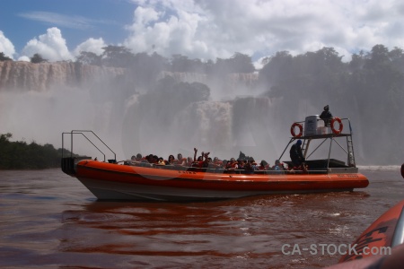Iguazu falls south america person spray tree.