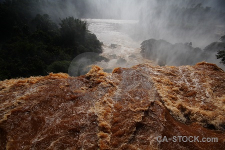 Iguazu falls water south america spray tree.