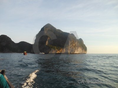 Island tropical vehicle cliff sea.
