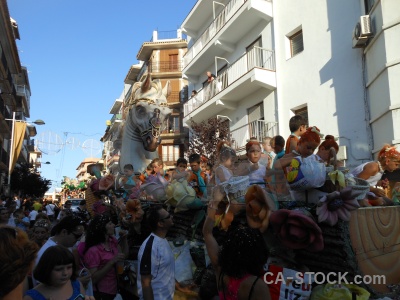 Javea fiesta building person road.