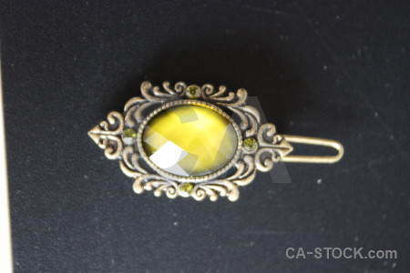 Jewellry yellow object.