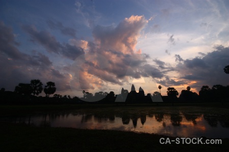 Khmer tree ruin cloud unesco.