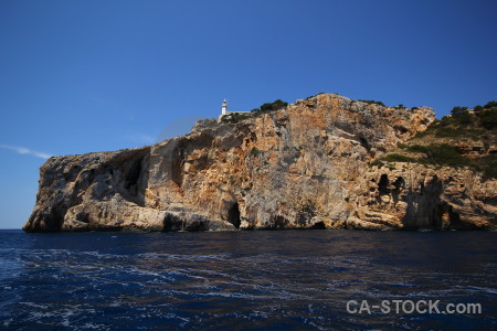 Lighthouse rock sea cliff europe.