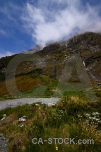 Mountain landscape south island cloud grass.