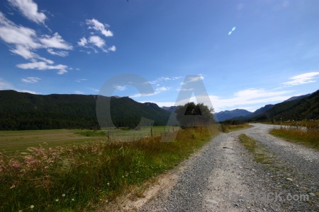 Mountain road south island cloud grass.