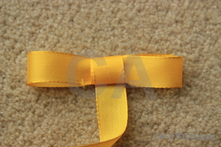 Object orange ribbon brown yellow.