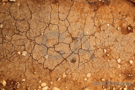 Orange texture crack brown soil.
