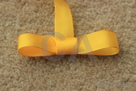 Orange yellow brown ribbon object.