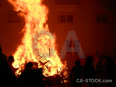 Person silhouette fiesta flame fire.