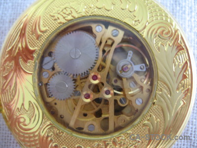 Pocket watch brown object.
