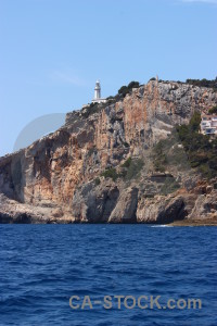Punta estrella lighthouse cliff spain sea.