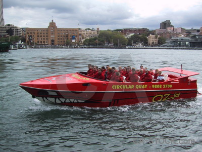 Red person boat vehicle.