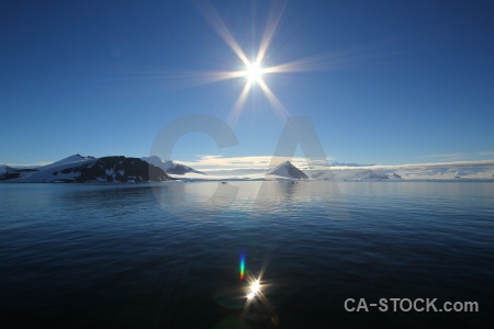 Reflection antarctica cruise mountain marguerite bay sun.