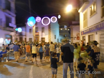 Road person javea fiesta building.